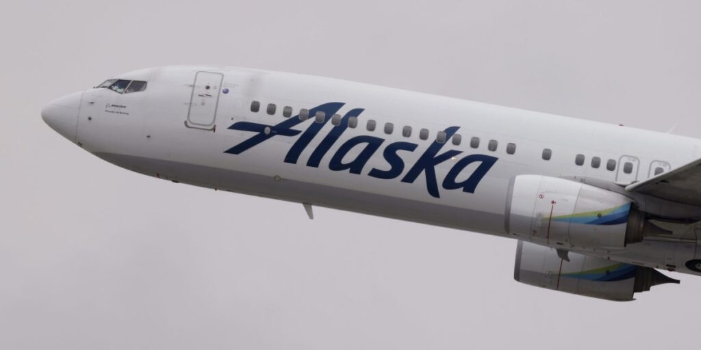 Alaska Air gets credit rating knocked down to junk status